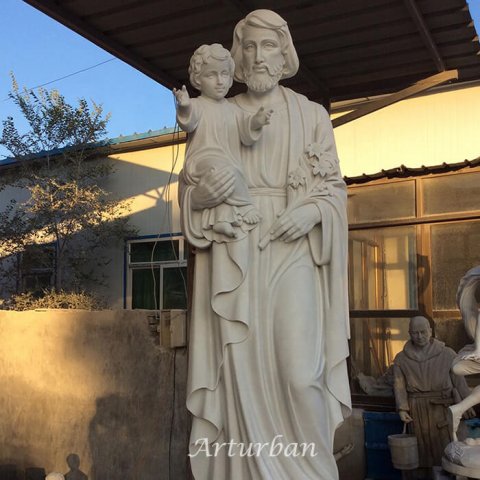 joseph holding baby jesus statue