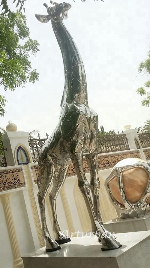 stainless steel giraffe statue outdoor