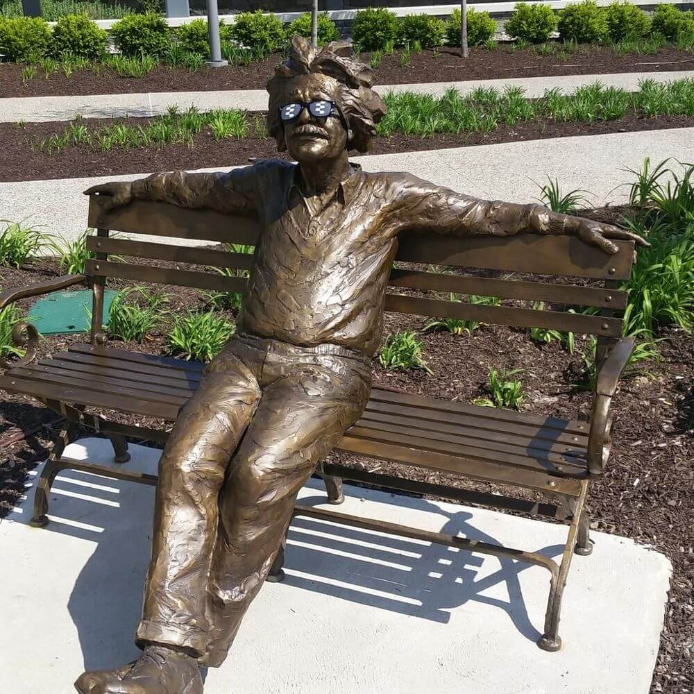 Albert einstein sculpture wearing glasses