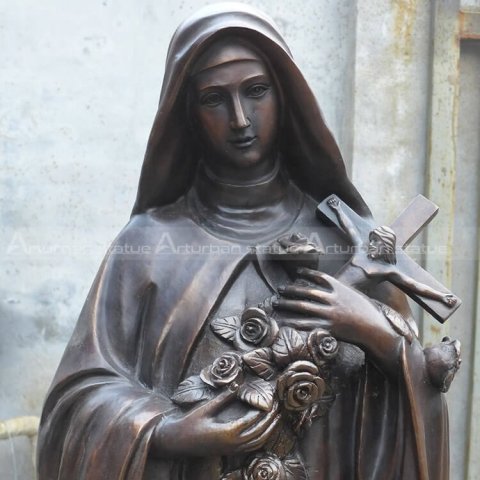 statue of our lady holding crucified christ