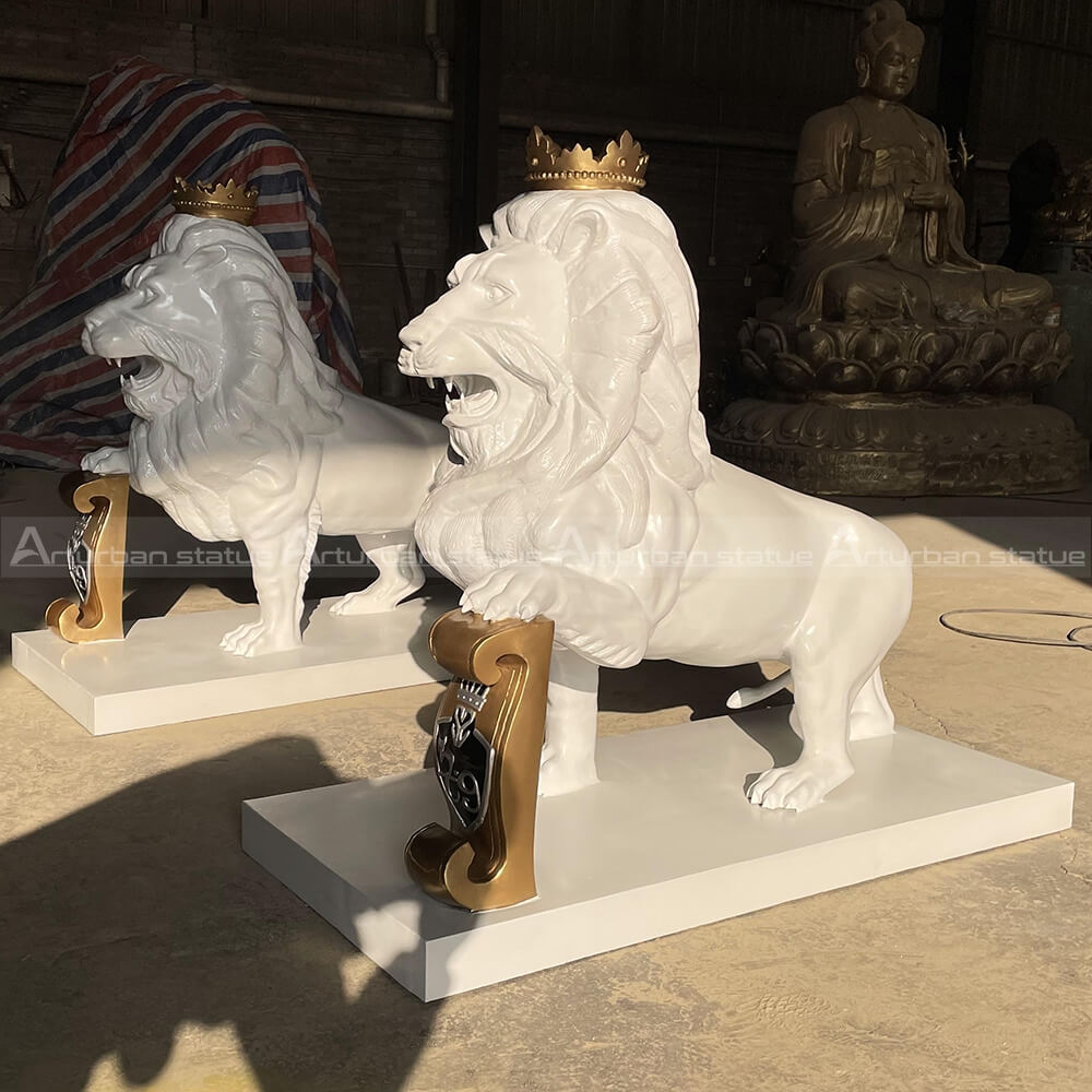 white lion statue with crown