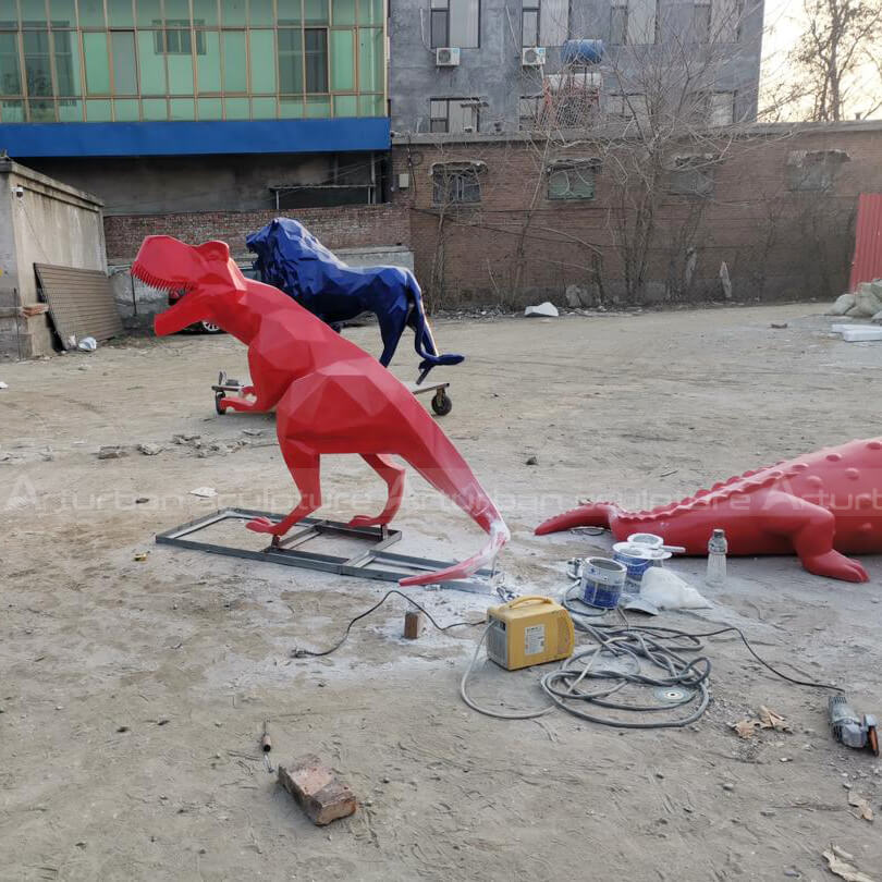 red dinosaur statue