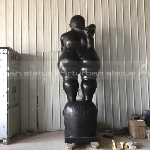 fat female statue