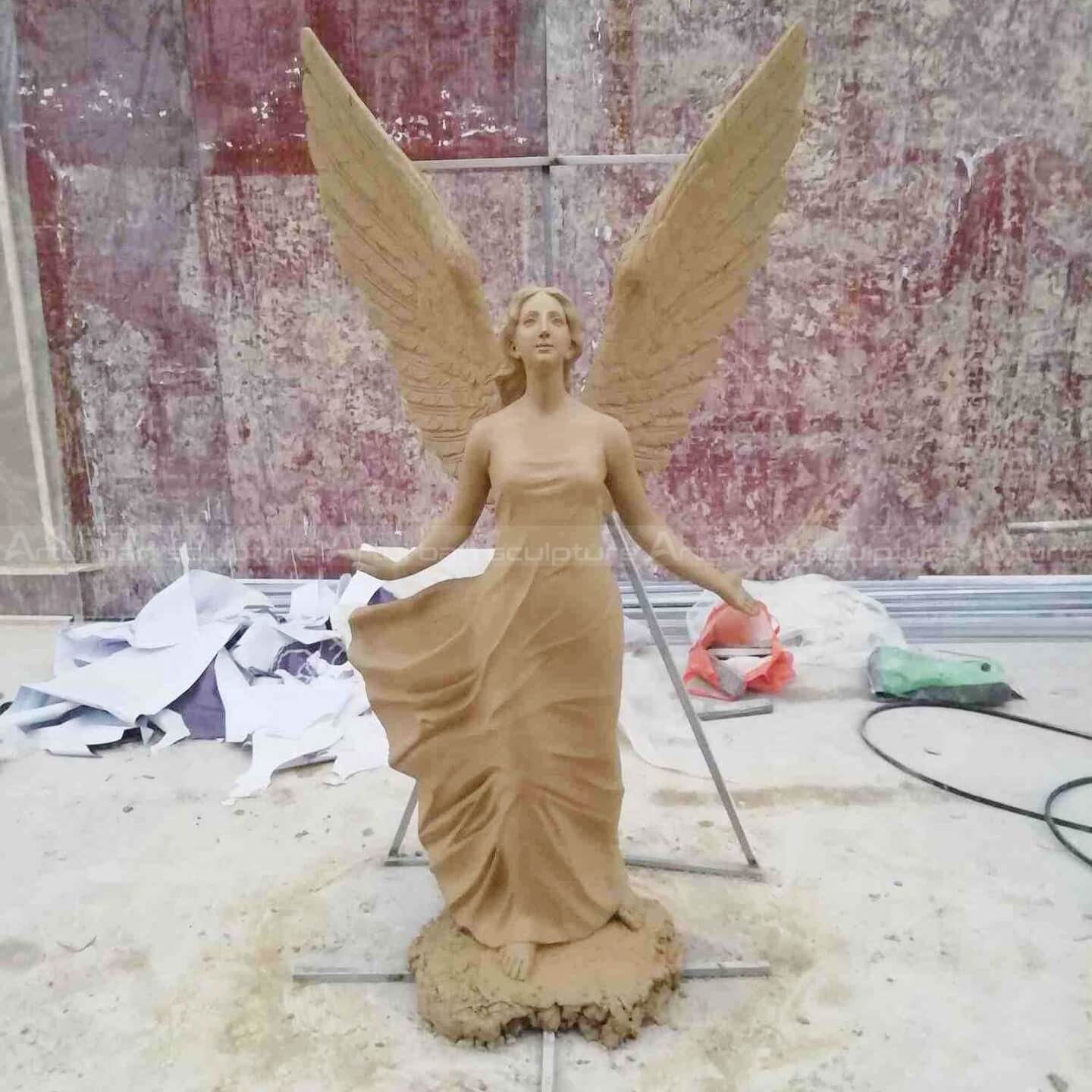 clay mold of flying angel sculpture