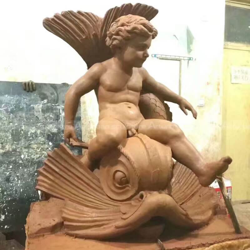 clay mold of cherub garden fountain