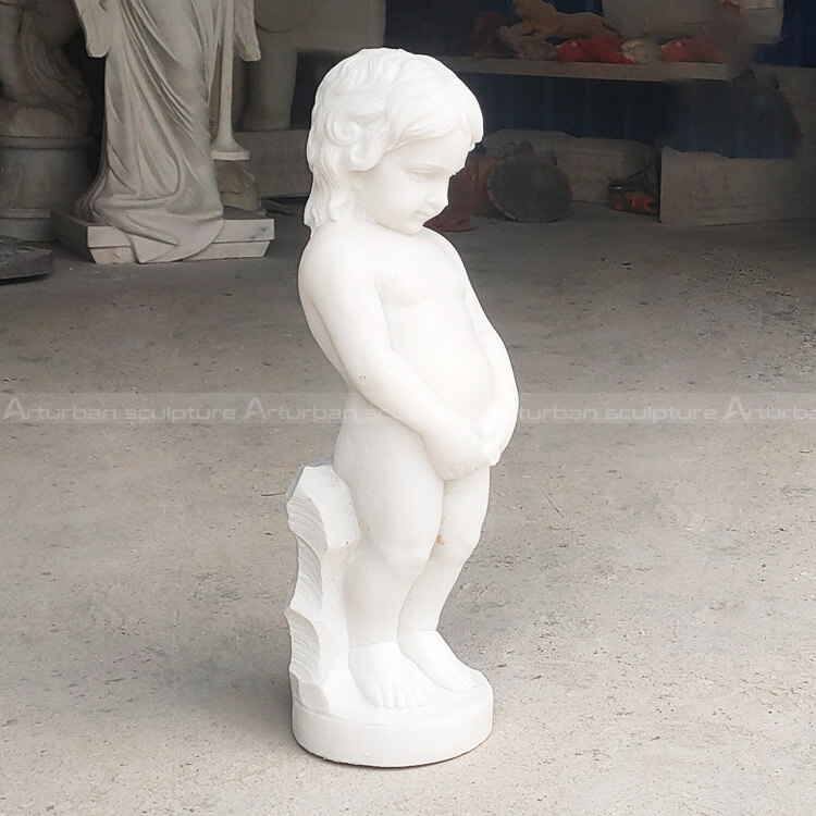 marble peeing boy statue