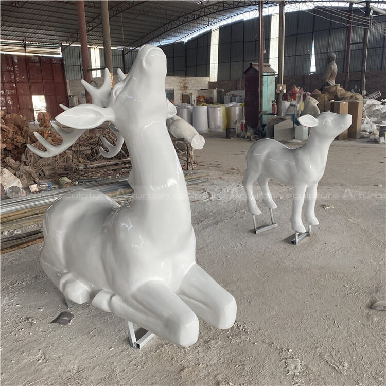 white deer figurine