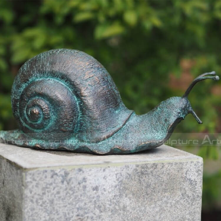 snail garden statues