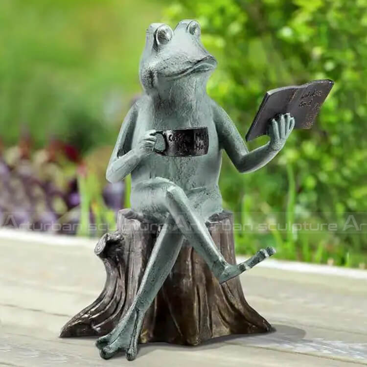 reading frog garden statue