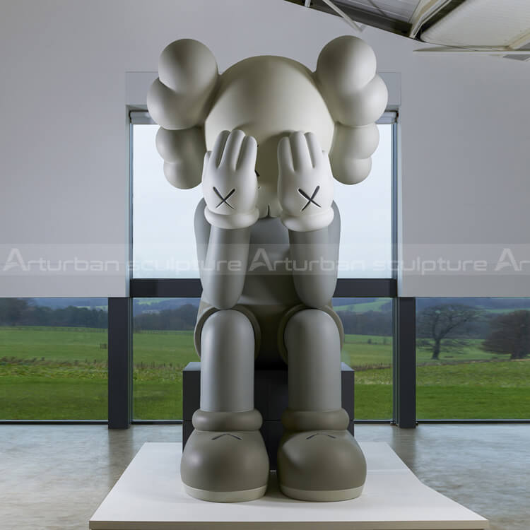 kaws sitting statue