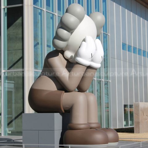 kaws sitting statue