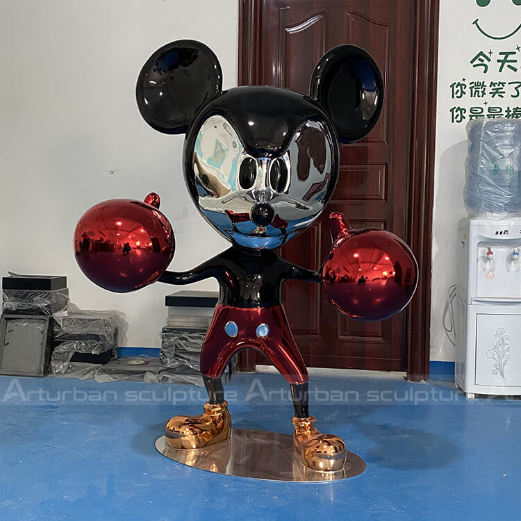 mickey mouse looking statue