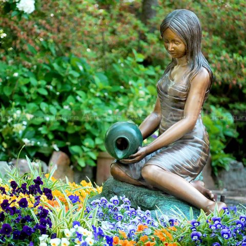 lady pouring water fountain