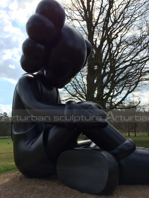 black kaws statue