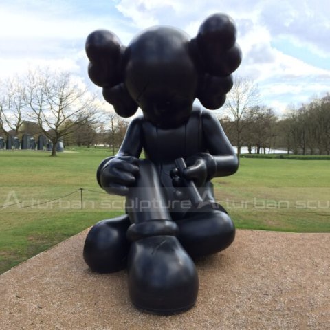 black kaws statue