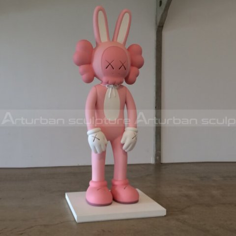 kaws pink statue