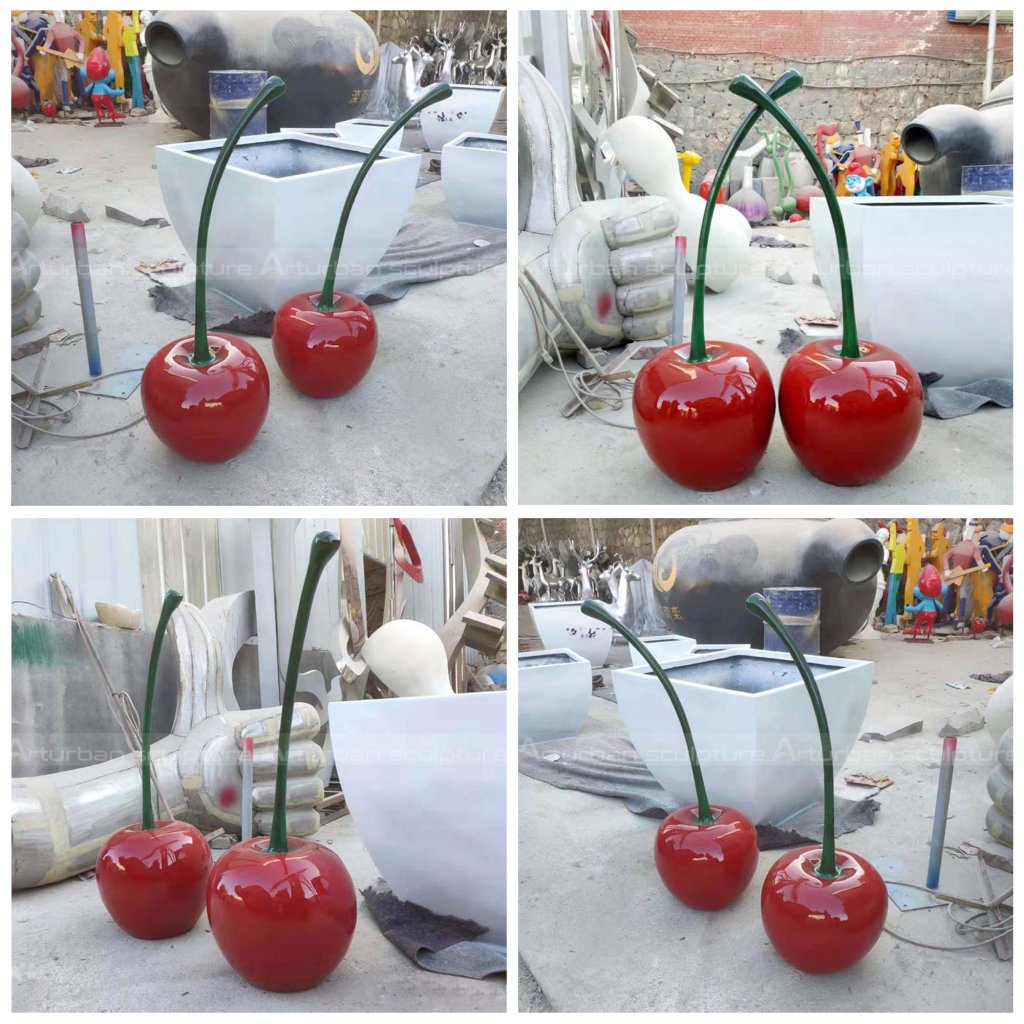 red cherry sculpture