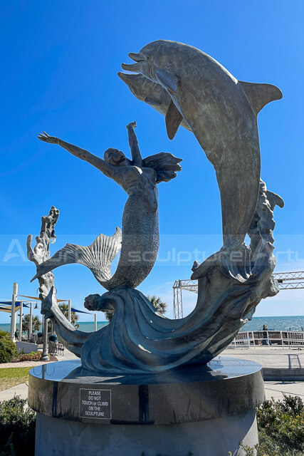 mermaid and dolphin statue