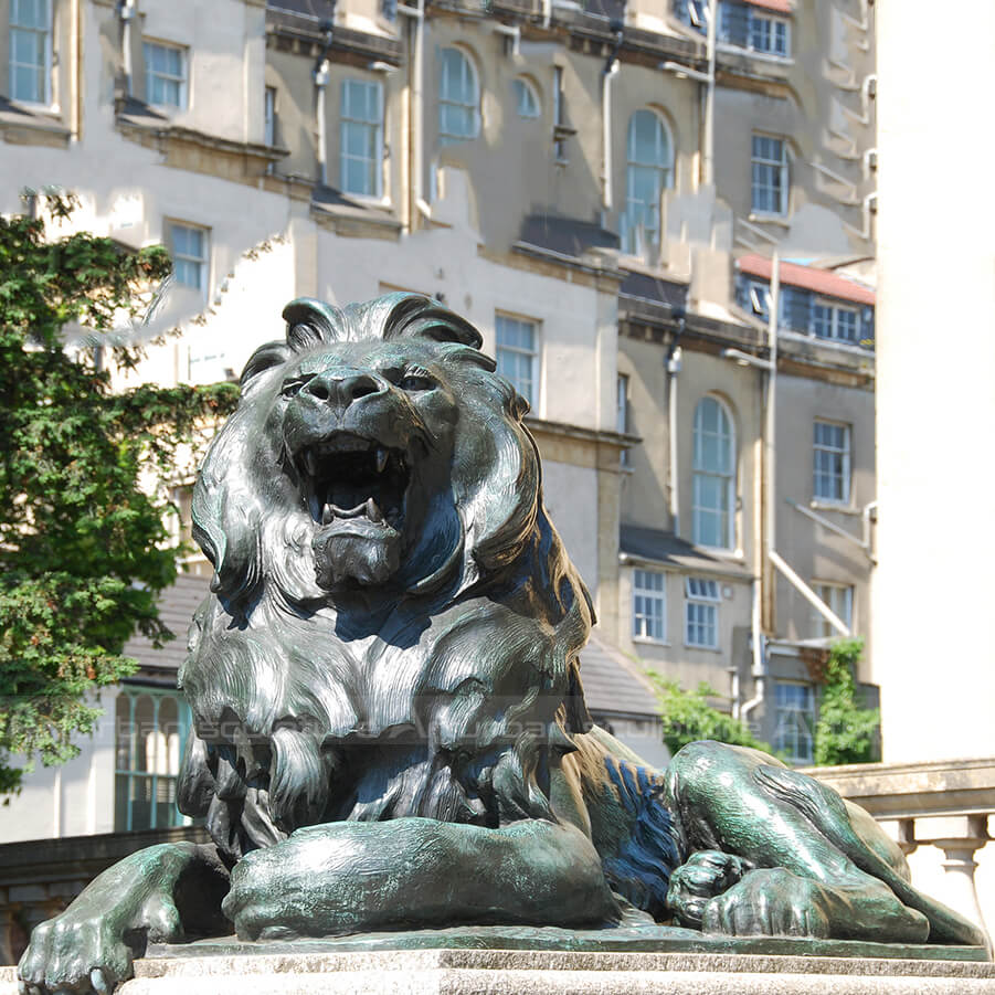 lion laying down statue