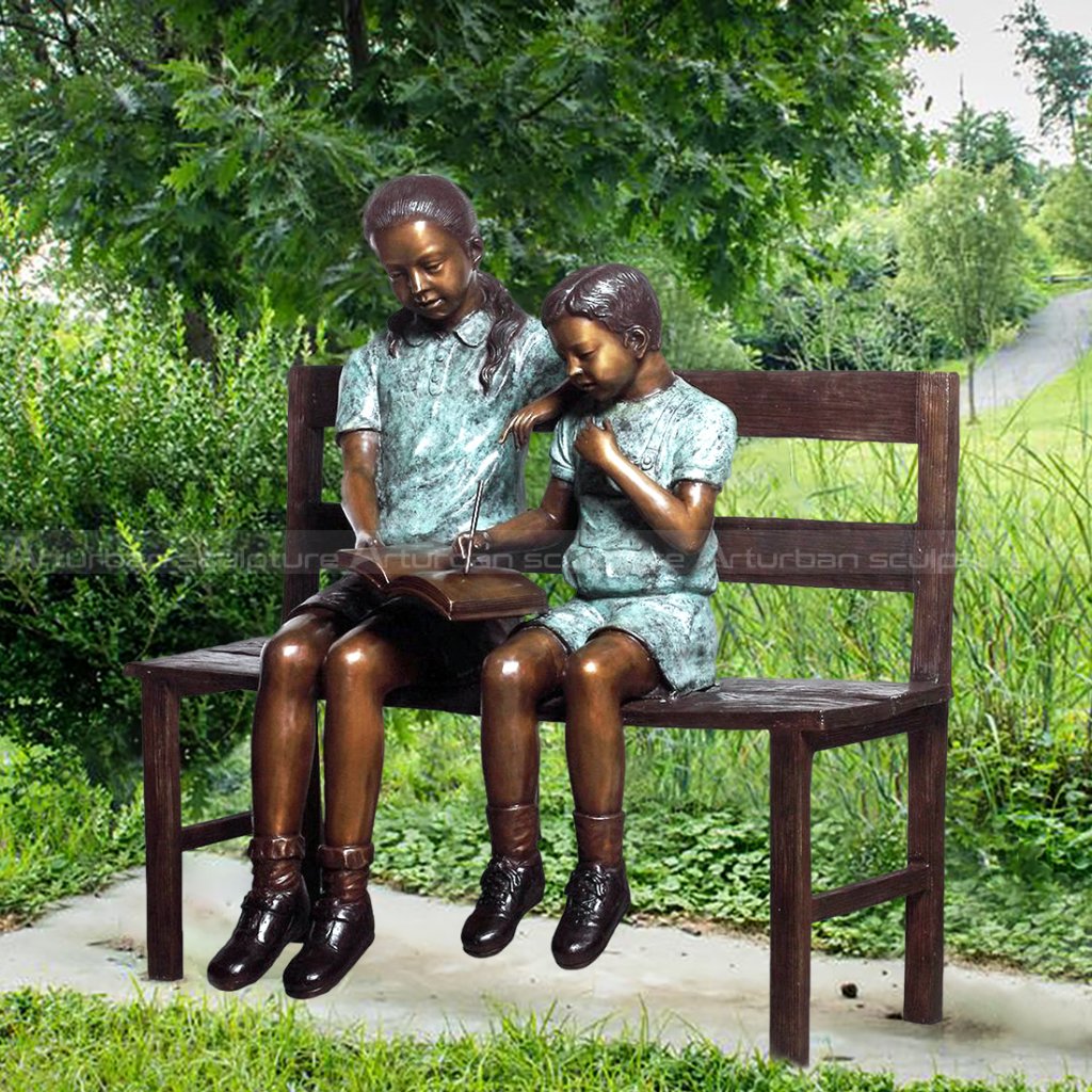 reading kid statue