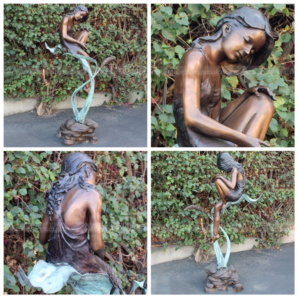 girl sitting on leaf sculpture