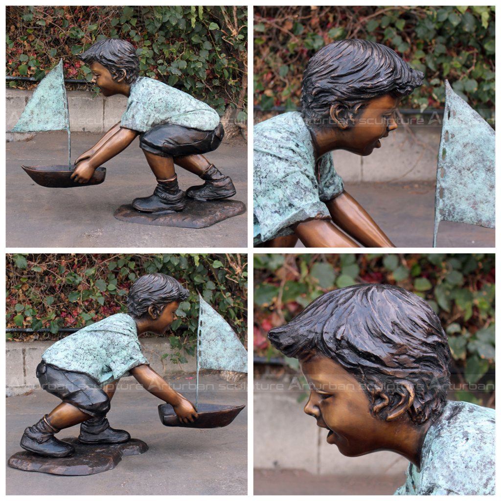 boy with boat sculpture