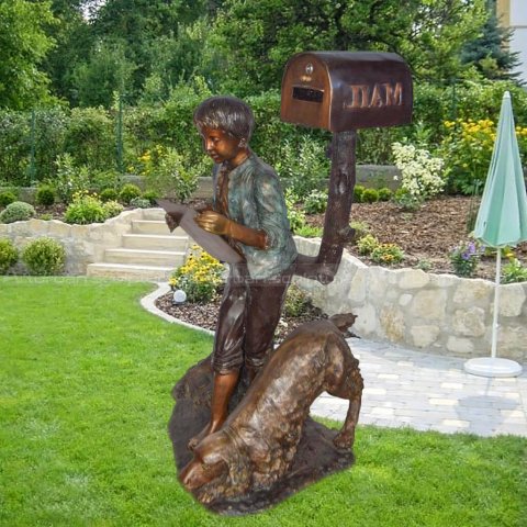 reading boy mailbox statue