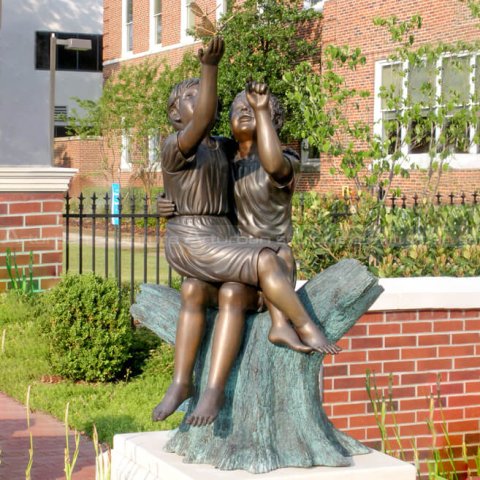 children and butterfly statue