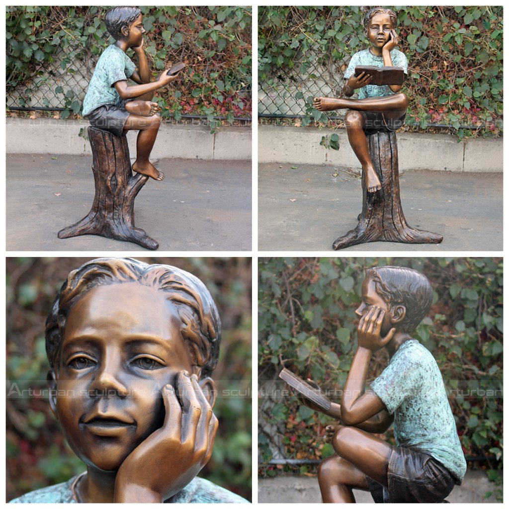 boy reading garden statue