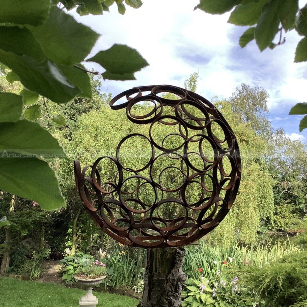 rusted steel garden sculpture