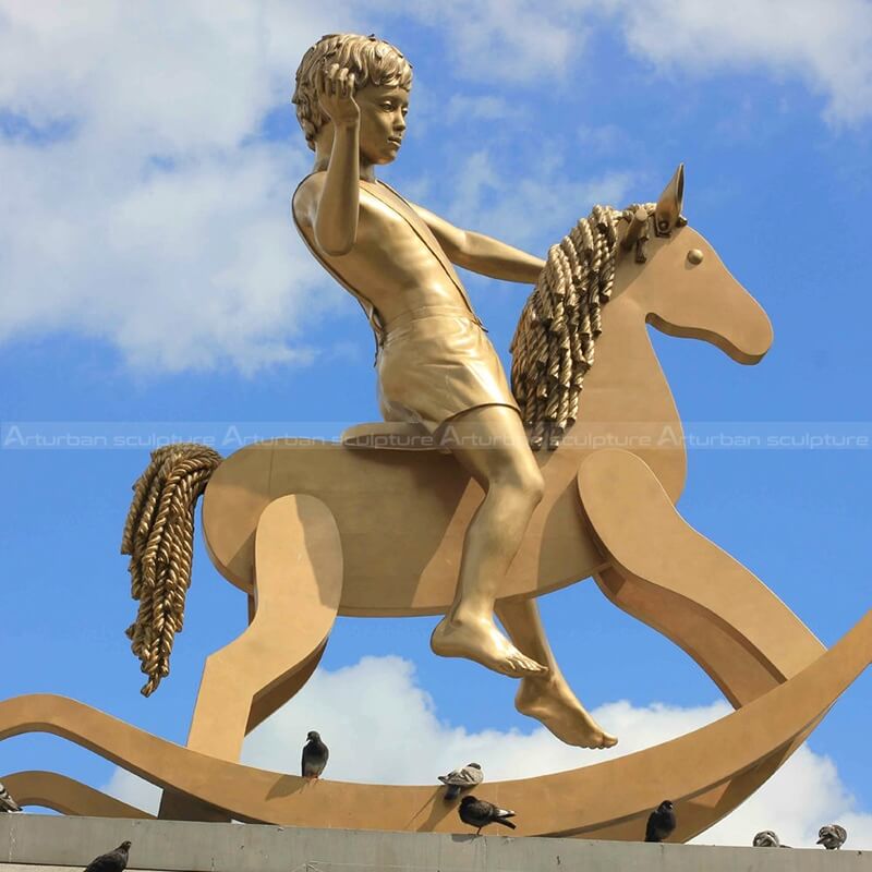 boy on hobby horse sculpture