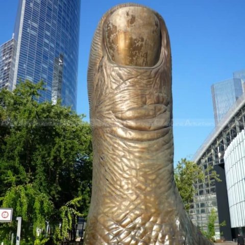 giant thumb statue