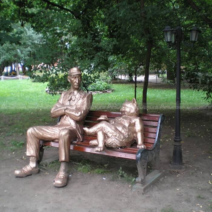 man and cat sculpture