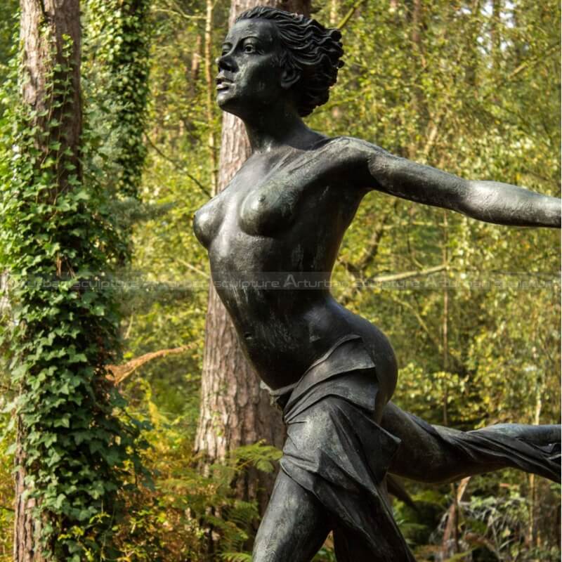 woman in the wind sculpture