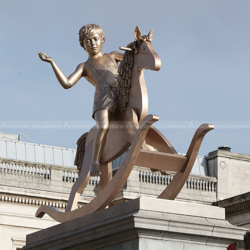 boy on hobby horse sculpture