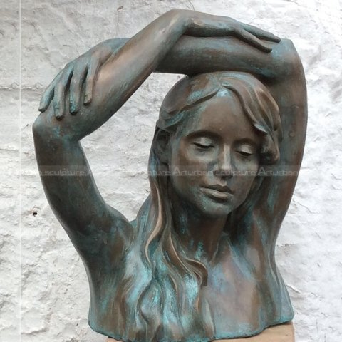 female bronze bust