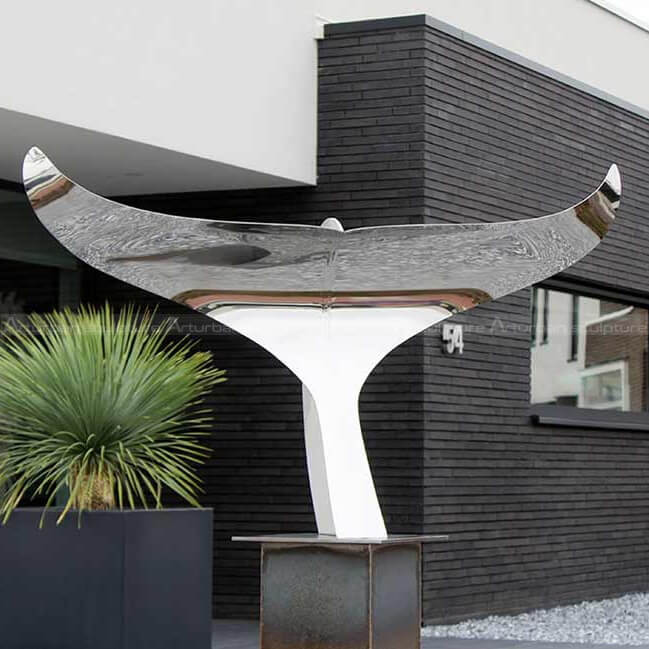 whale tail garden sculpture