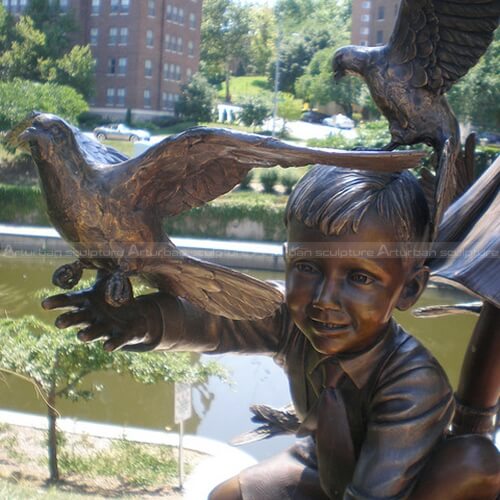 girl and pigeon sculpture