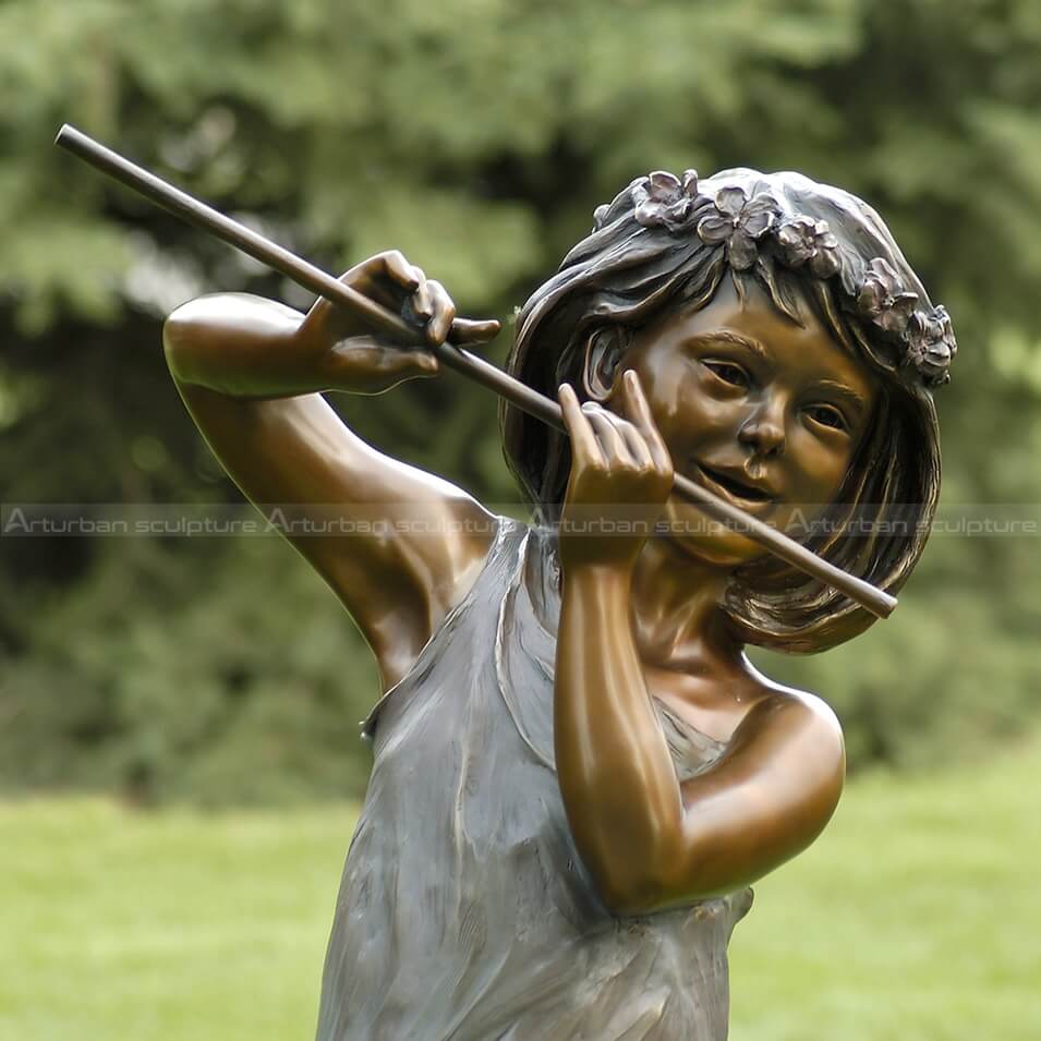 girl with flute sculpture