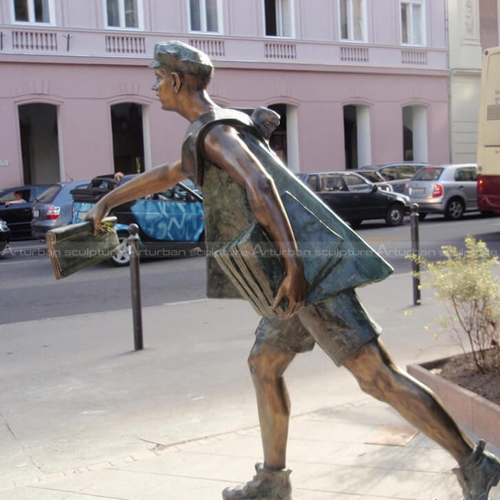 Newspaper boy statue