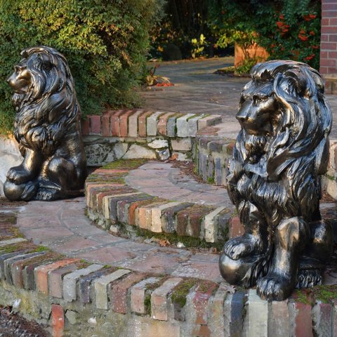 lion with ball statue