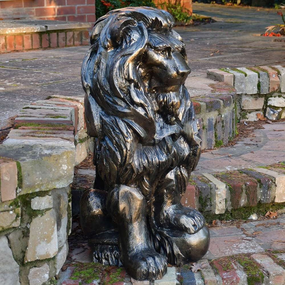 lion with ball statue