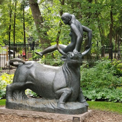 woman riding bull statue