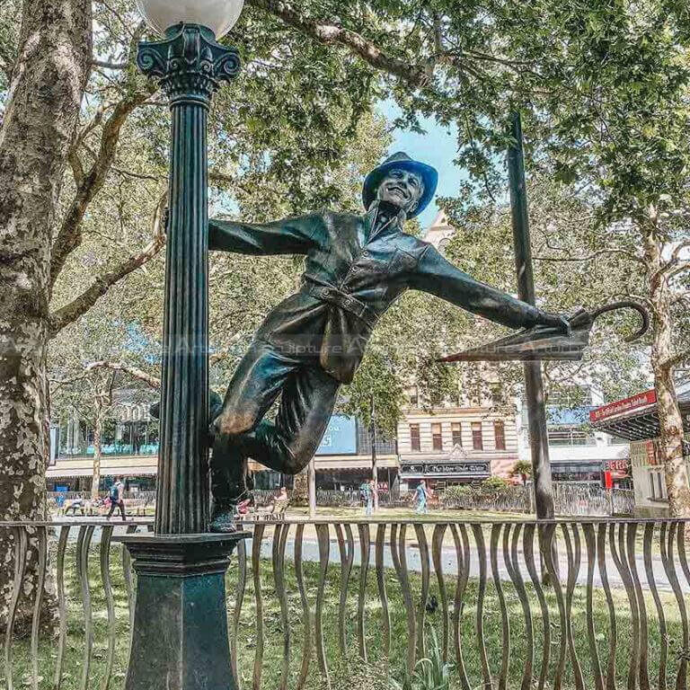 singing in the rain statue