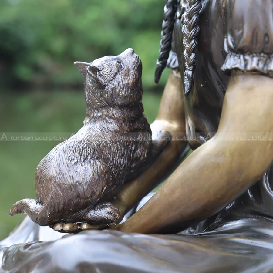 girl with cat sculpture