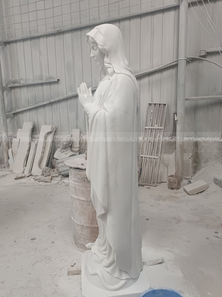 Marble virgin Mary statue is a sculpture with religious significance and artistic value. This sculpture is based on the theme of the Virgin Mary