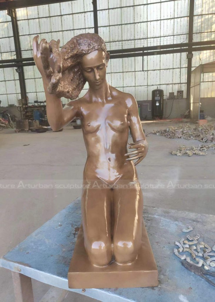 girl washing her hair sculpture