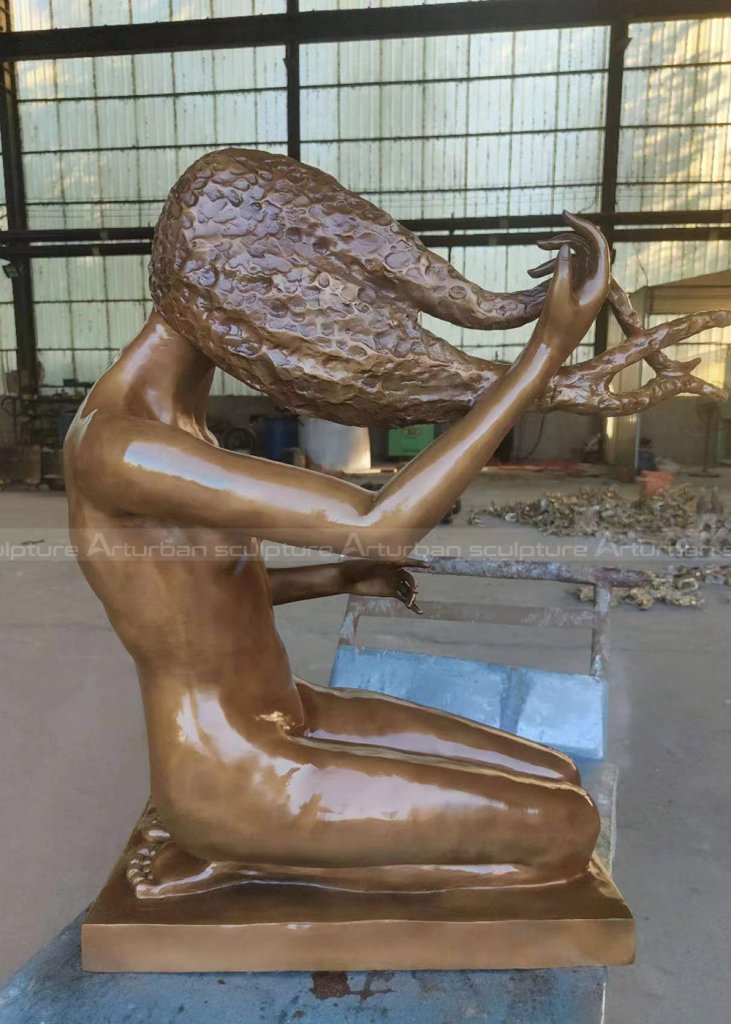 girl washing her hair sculpture