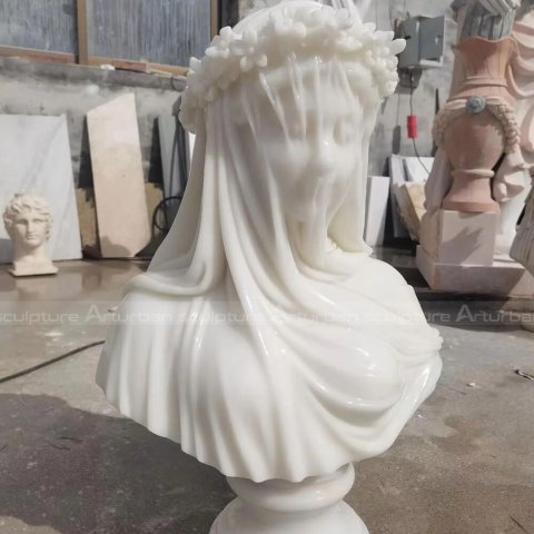 veiled goddess statue