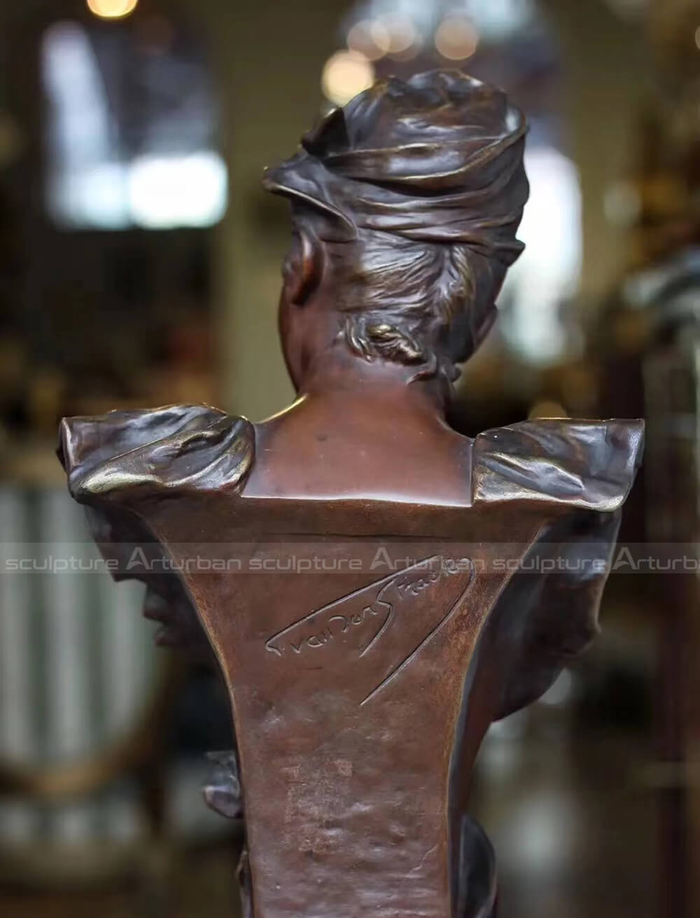 bronze female bust